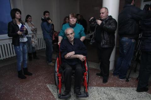 Azerbaijanis beat father of captive family in front of children