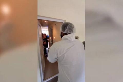 WATCH: Armenian HAZMAT team’s standard protocol for congratulating quarantined people on birthday