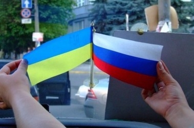 Киев обещает особый статус русского языка, а регионам - местные выборы