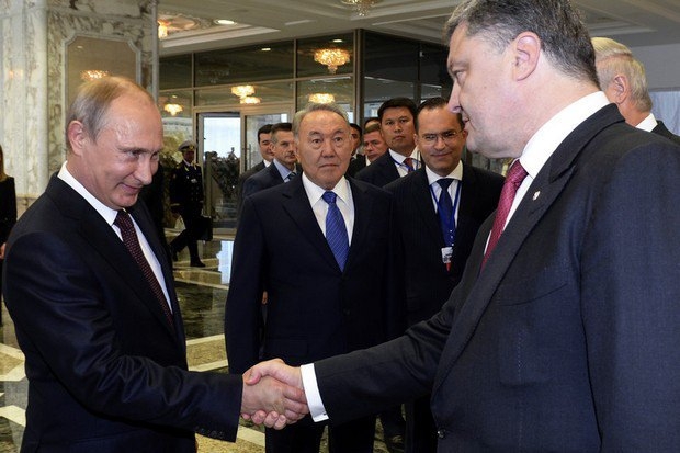 Путин оценил переговоры с Порошенко как позитивные