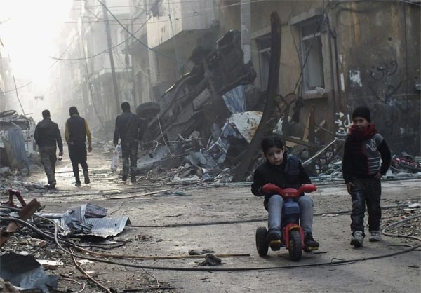 Death toll in Homs raises to 32, mostly children