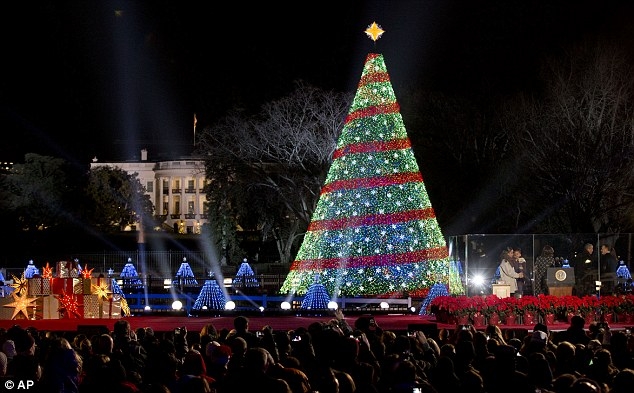 Obama lights the national Christmas Tree