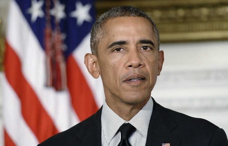 On Christmas Obama marks end of Afghan combat