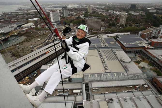 101-year-old woman breaks world record by roping down one of Britain's tallest buildings