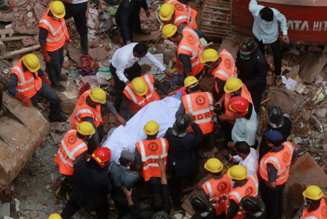 Eleven killed in building collapse in India