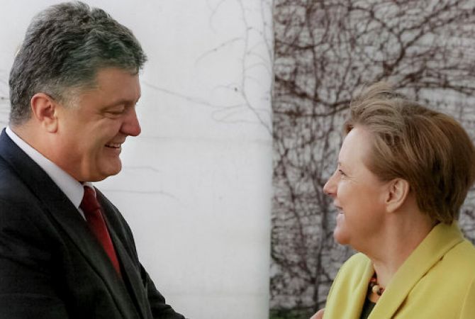 Порошенко обсудил с Меркель подготовку к саммиту "четверки"