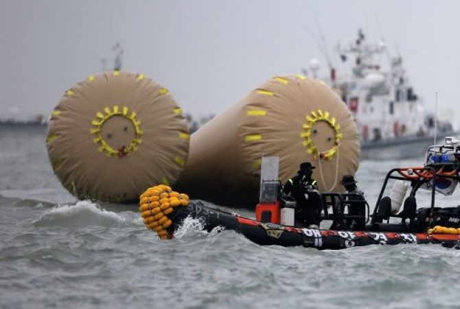 Sewol ferry disaster: South Korea begins operation to lift sunken ferry