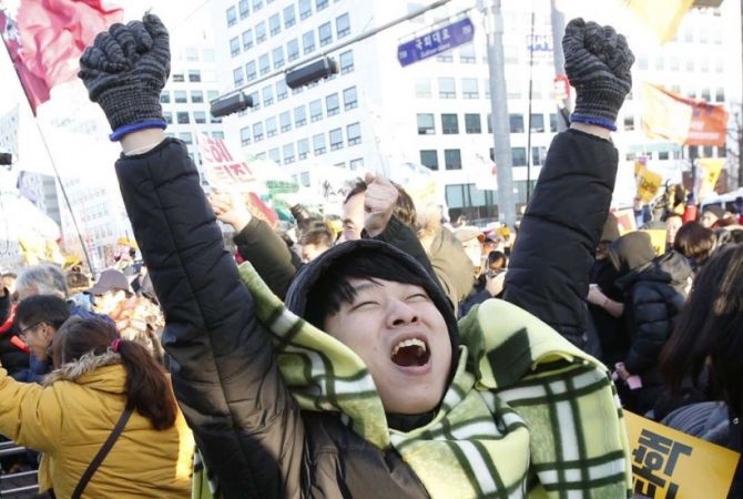 Thousands of South Koreans celebrate President’s impeachment