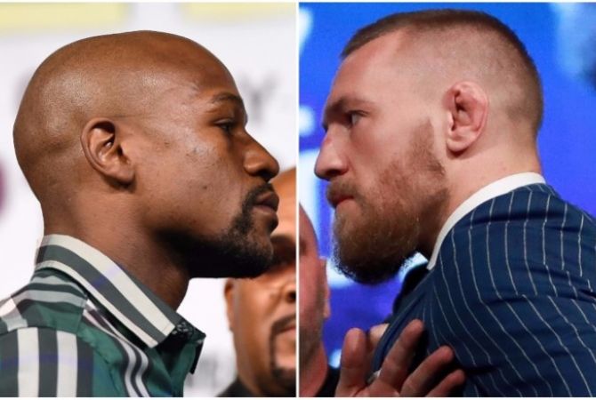 Dream "billion dollar" superfight halfway near as Conor McGregor signs contract to fight Floyd 
Mayweather 