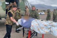 قوات حفظ السلام الروسية ترافق عمليات النقل الجوي لضحايا انفجار مستودع الوقود في آرتساخ-
ناغورنو كاراباغ
