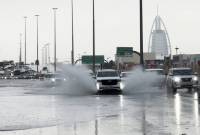 Dubai: chaos at world’s second-busiest airport as UAE and Oman reel from deadly storms