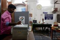 India's PM Modi casts his vote in world's largest elections