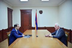 SRC Chairman presents recent reforms to President of Armenia
