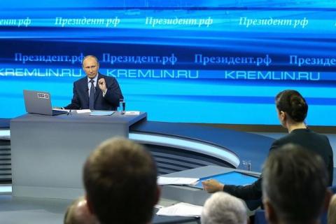Vladimir Putin sets news Q&A session record 