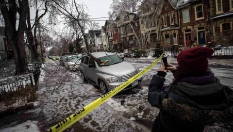 Ice, outages linger after U.S., Canadian storm