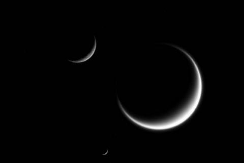 Cassini captures triple crescent moon on Saturn