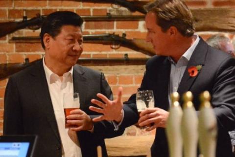 Cameron presents crystal platter to President Xi Jinping and a handbag to Jinping’s wife