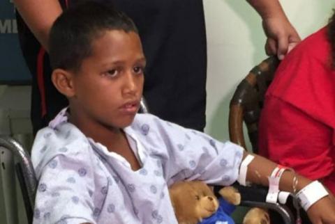 10 year-old boy avoided being eaten by a six-foot shark