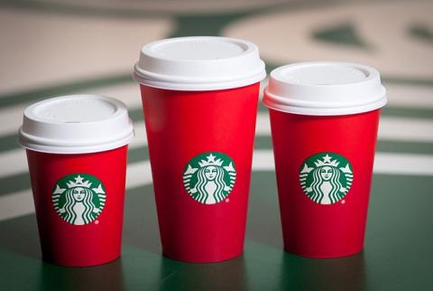 Some Starbucks coffee lovers are dissatisfied with company's new Holiday red cups