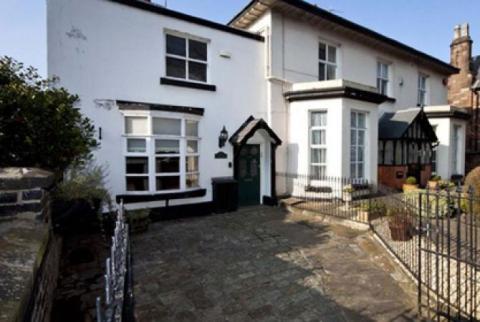 John Lennon's former home up for sale