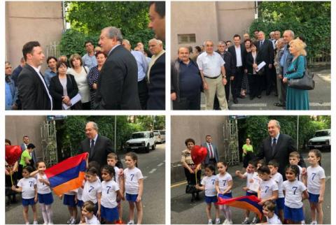 President Sarkissian meets with former employees of Nairit protesting near presidential residence