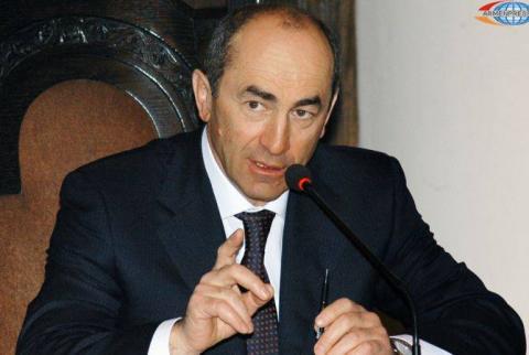 Former President Robert Kocharyan denies wrongdoing as prosecutors request court to issue arrest warrant over 2008 unrest 