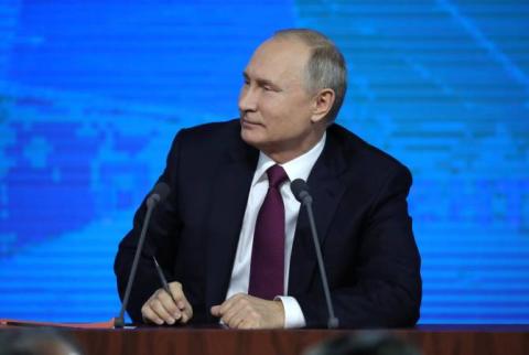 Russians name Putin politician of the year in poll 
