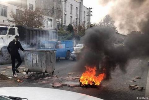Riots erupt in Iran after government announces petrol price hike 