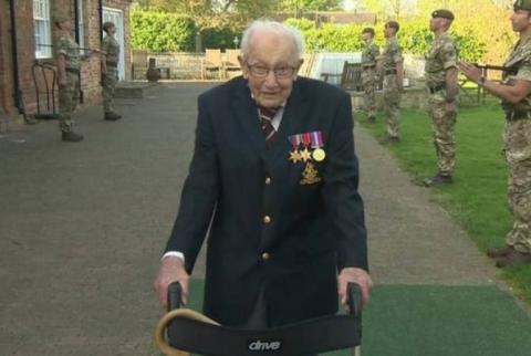 Столетний ветеран собрал миллионы для британских врачей марафоном на ходунках в саду. BBC