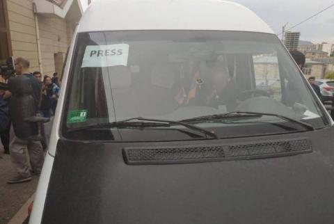 Armenia publishes photos of bus carrying local, intl. reporters targeted by Azerbaijani shelling