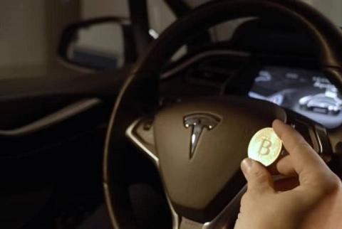 Tesla инвестировала $1,5 млрд в биткойн