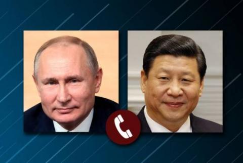 Си Цзиньпин провел телефонный разговор с Владимиром Путиным