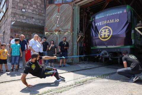 Strongman Yuri Sakunts pulls 65 tonnes with one pinky 