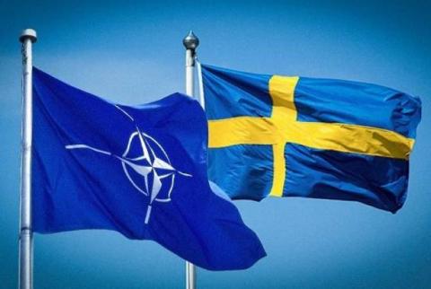 Turkey's Erdogan signs off on Sweden's NATO membership