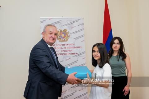 Vika Avetisyan from Hadrut presents her collection of fairy tales 
in Yerevan