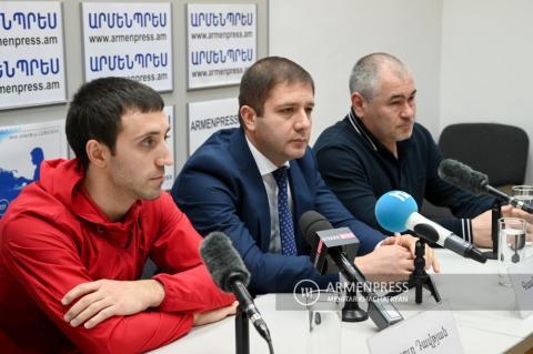 Gymnast Artur Davtyan, gymnastics federation president 
Gagik Vanoyan and Team Armenia coach Hakob Serobyan 
deliver press conference 
