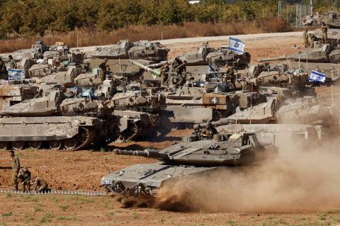 An Israeli tank maneuvers, amid the ongoing conflict between Israel and the Palestinian Islamist group Hamas, near the Israel-Gaza Border, in southern Israel, May 7, 2024. REUTERS/Amir Cohen