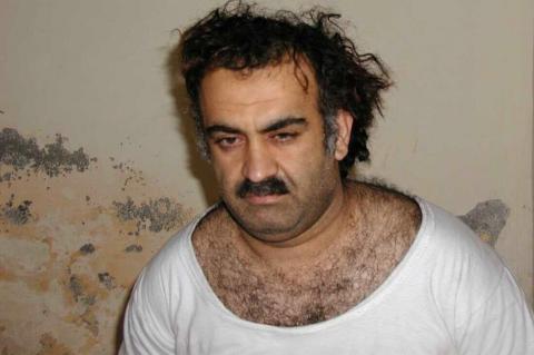 FILE- Khalid Sheikh Mohammed, the alleged Sept. 11 mastermind, is seen shortly after his capture during a raid in Pakistan Saturday March 1, 2003 in this photo obtained by the Associated Press. The man accused of being the main plotter in al-Qaeda's Sept. 11, 2001 attacks has agreed to plead guilty, The Defense Department said Wednesday. (AP Photo, FILE)