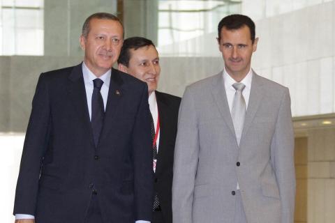 Türkiye Dışişleri Bakanı Erdoğan ve Esad'ın üçüncü bir ülkede buluşmasının mümkün olduğunu söyledi