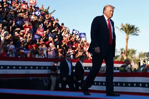 Man arrested with guns near Trump Coachella rally had "homemade" license plate, multiple passports