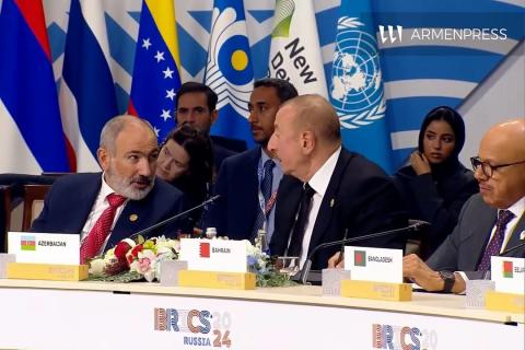 Armenian Prime Minister Nikol Pashinyan, Azerbaijani President Ilham Aliyev talk during BRICS+ Summit