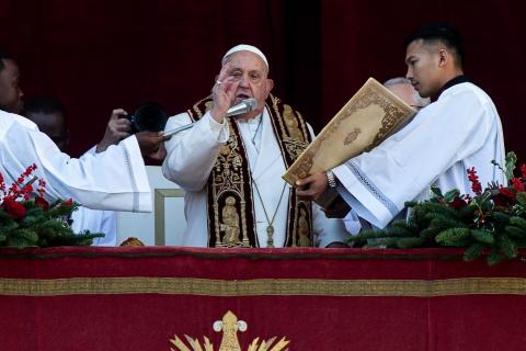 Pope Francis urges all nations to 'silence the sounds of arms' in Christmas address