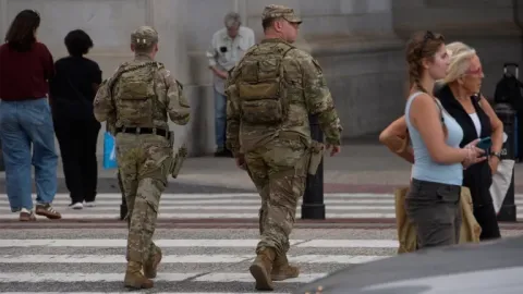 Trump threatens to deploy troops to Baltimore to 'clean up' crime