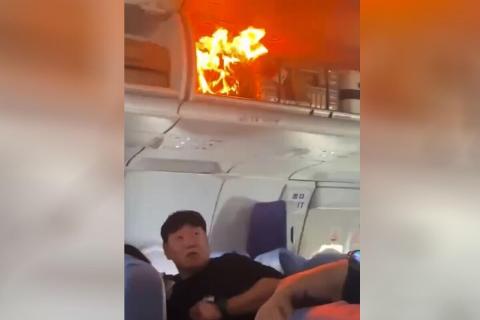 Carry-on luggage fire aboard Air China flight to South Korea forces emergency landing