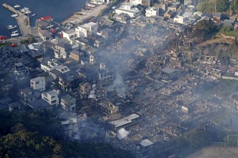 Fire razes 170 buildings in southern Japan, one missing