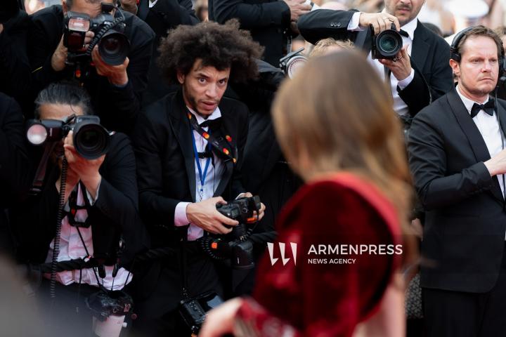 CANNES FRANCE - 18, May, 2025: Cast and crew of "The Phoenician Scheme" attend the red carpet premiere during the 78th Annual Cannes Film Festival at Palais des Festivals. The film, directed by Wes Anderson, features Benicio del Toro, Mia Threapleton, Michael Cera, Riz Ahmed, Mathieu Amalric, Richard Ayoade, Jeffrey Wright, Benedict Cumberbatch, Rupert Friend, Hope Davis, Charlotte Gainsbourg, and Antonia Desplat