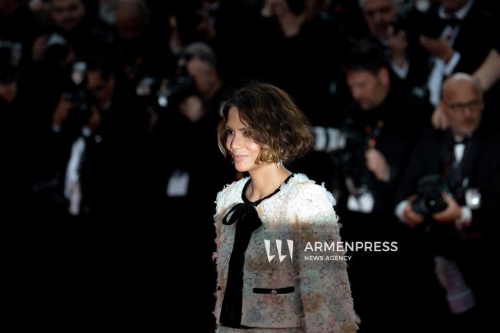 CANNES FRANCE - 18, May, 2025: Cast and crew of "The Phoenician Scheme" attend the red carpet premiere during the 78th Annual Cannes Film Festival at Palais des Festivals. The film, directed by Wes Anderson, features Benicio del Toro, Mia Threapleton, Michael Cera, Riz Ahmed, Mathieu Amalric, Richard Ayoade, Jeffrey Wright, Benedict Cumberbatch, Rupert Friend, Hope Davis, Charlotte Gainsbourg, and Antonia Desplat