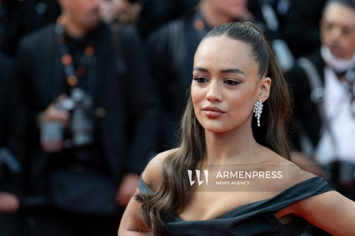 CANNES FRANCE - 18, May, 2025: Cast and crew of "The Phoenician Scheme" attend the red carpet premiere during the 78th Annual Cannes Film Festival at Palais des Festivals. The film, directed by Wes Anderson, features Benicio del Toro, Mia Threapleton, Michael Cera, Riz Ahmed, Mathieu Amalric, Richard Ayoade, Jeffrey Wright, Benedict Cumberbatch, Rupert Friend, Hope Davis, Charlotte Gainsbourg, and Antonia Desplat