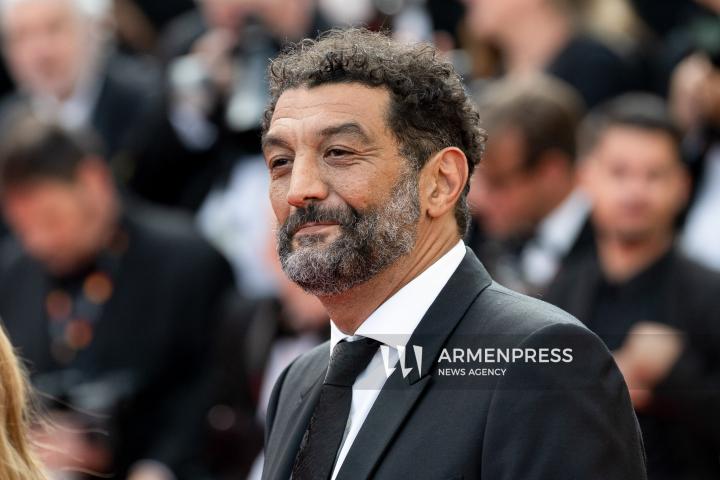 CANNES FRANCE - 18, May, 2025: Cast and crew of "The Phoenician Scheme" attend the red carpet premiere during the 78th Annual Cannes Film Festival at Palais des Festivals. The film, directed by Wes Anderson, features Benicio del Toro, Mia Threapleton, Michael Cera, Riz Ahmed, Mathieu Amalric, Richard Ayoade, Jeffrey Wright, Benedict Cumberbatch, Rupert Friend, Hope Davis, Charlotte Gainsbourg, and Antonia Desplat