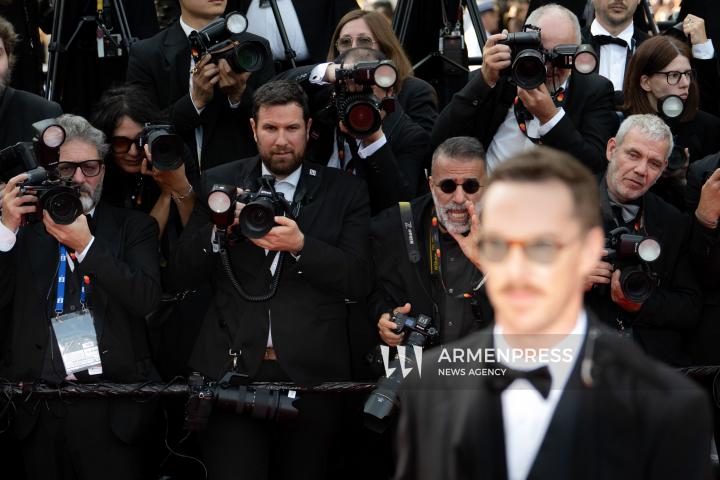 CANNES FRANCE - 18, May, 2025: Cast and crew of "The Phoenician Scheme" attend the red carpet premiere during the 78th Annual Cannes Film Festival at Palais des Festivals. The film, directed by Wes Anderson, features Benicio del Toro, Mia Threapleton, Michael Cera, Riz Ahmed, Mathieu Amalric, Richard Ayoade, Jeffrey Wright, Benedict Cumberbatch, Rupert Friend, Hope Davis, Charlotte Gainsbourg, and Antonia Desplat